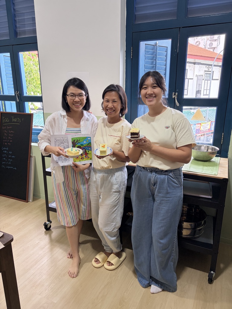 Mindscape workshop participants with their completed colouring artwork
